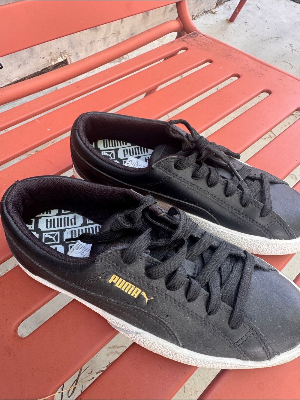 Puma Black Sneakers with White Sole and Gold Logo
